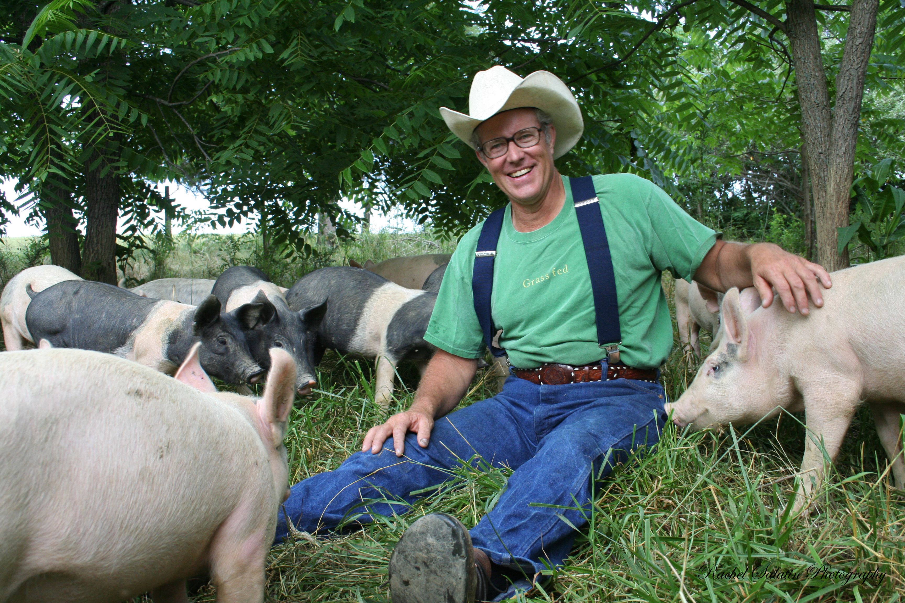 Joel Salatin with pigs