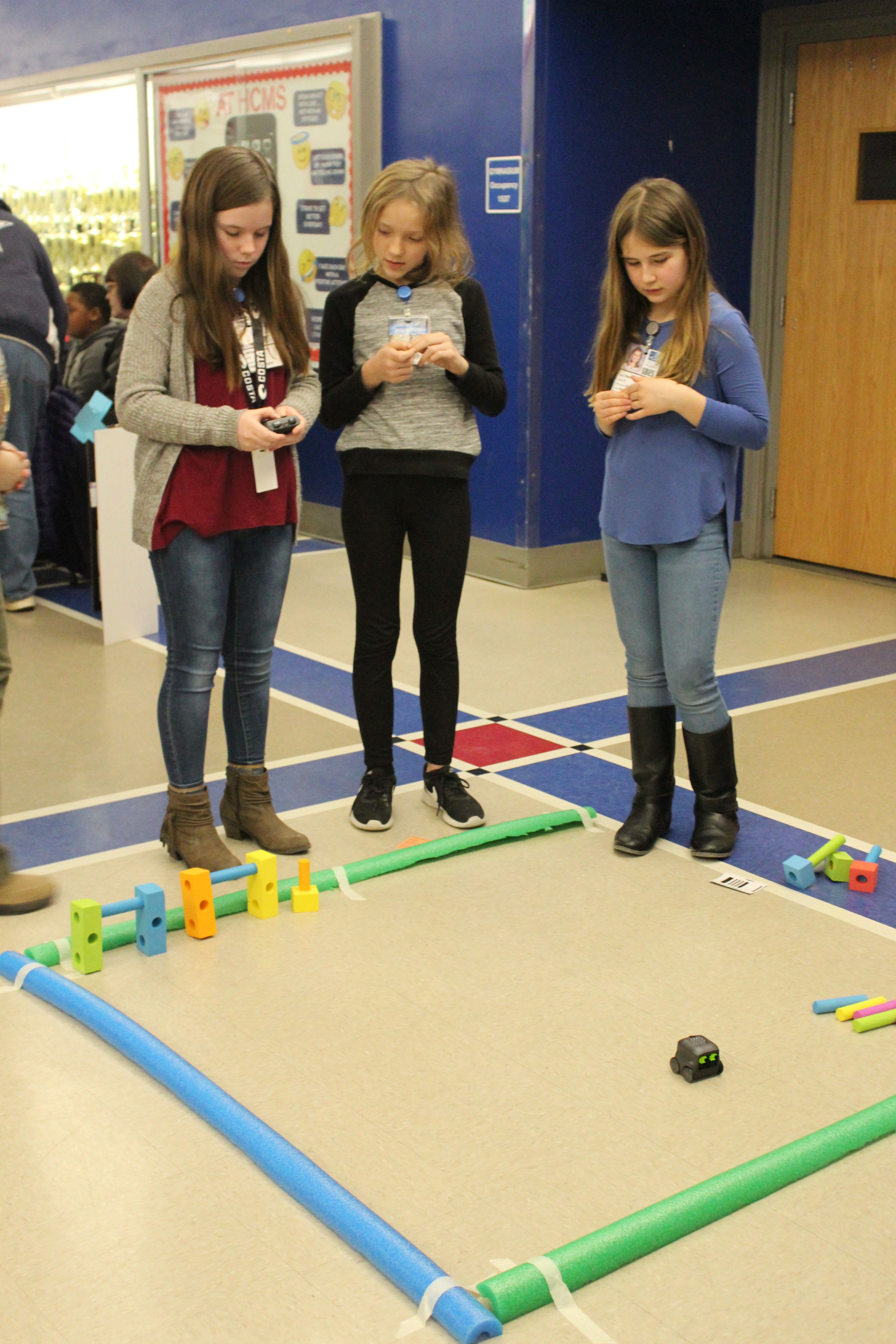 Students program Nila the robot through Halifax County Public Schools' Girls Who Code club