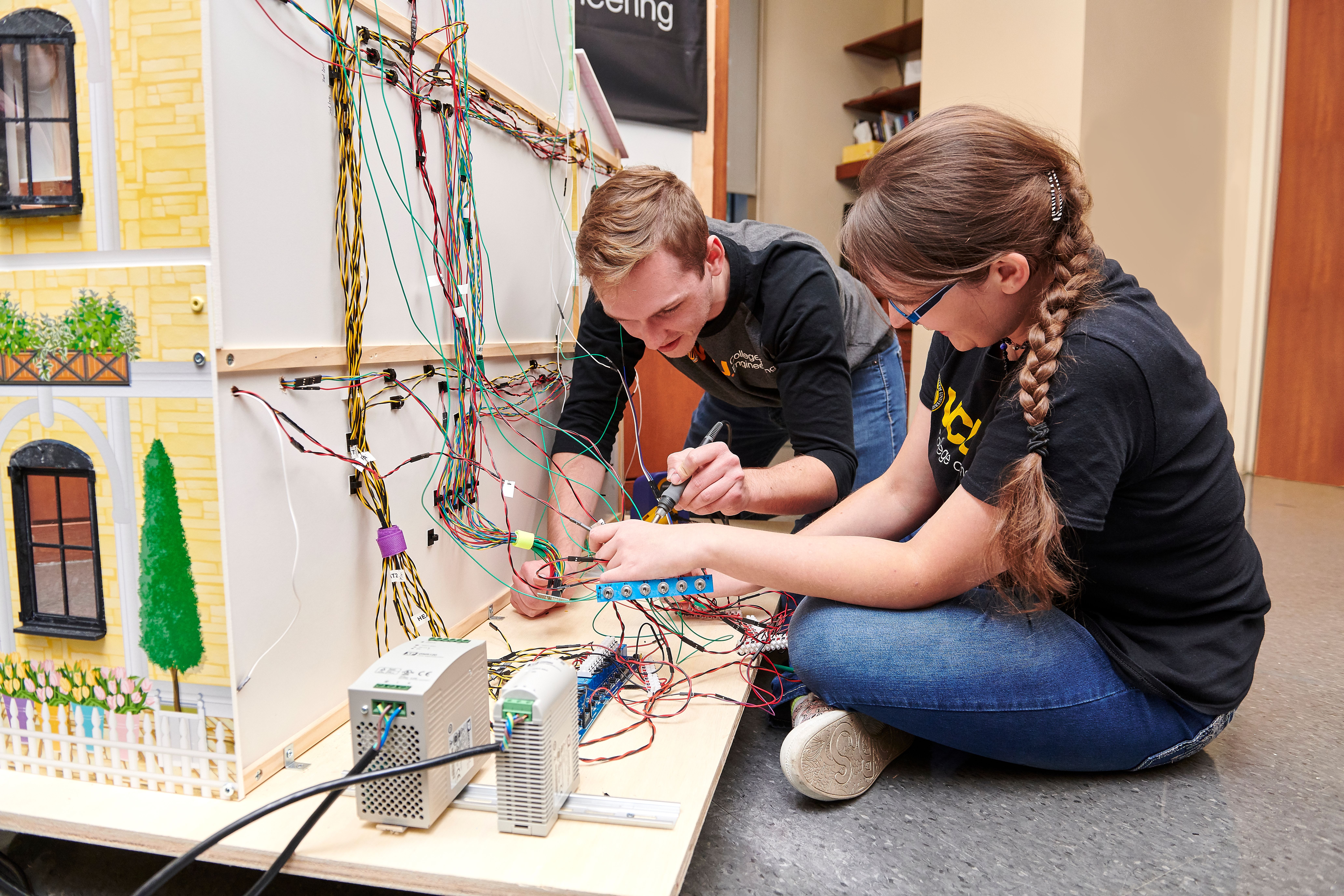 Virginia Commonwealth University students work on a smart home simulator