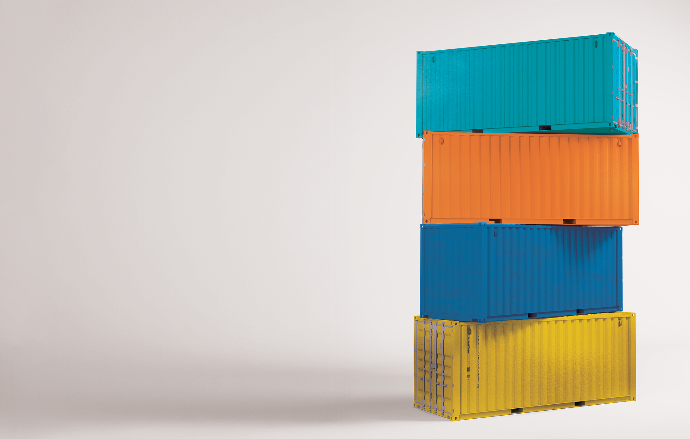 Four shipping containers sit stacked on top each other