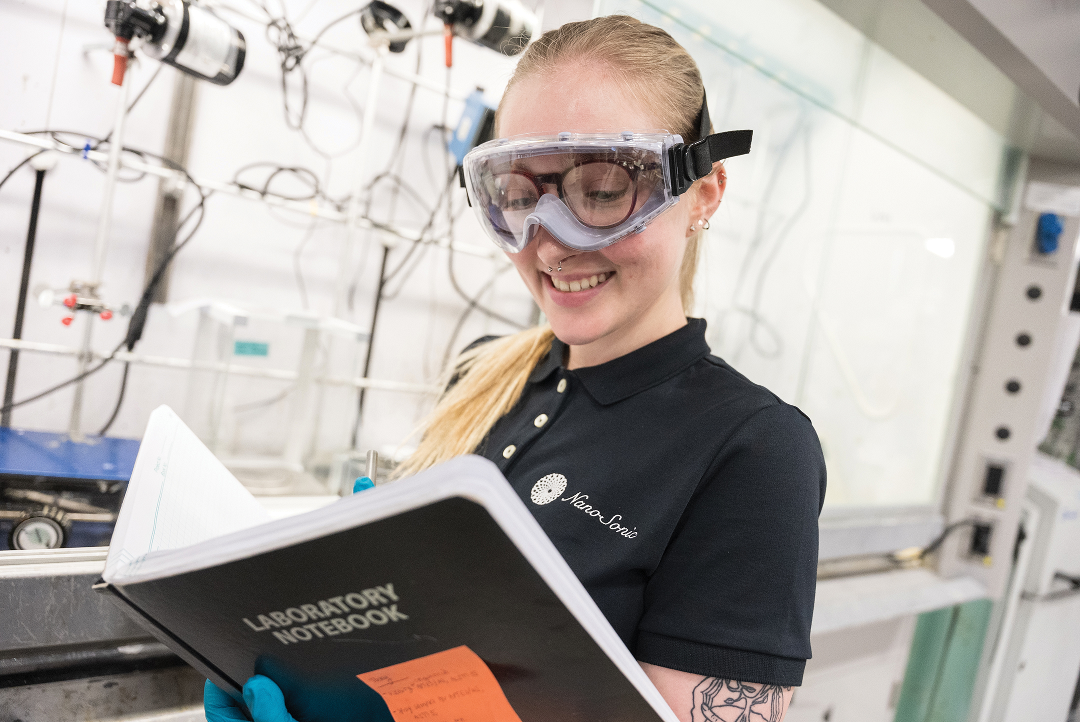 Nanosonic employee reading a book