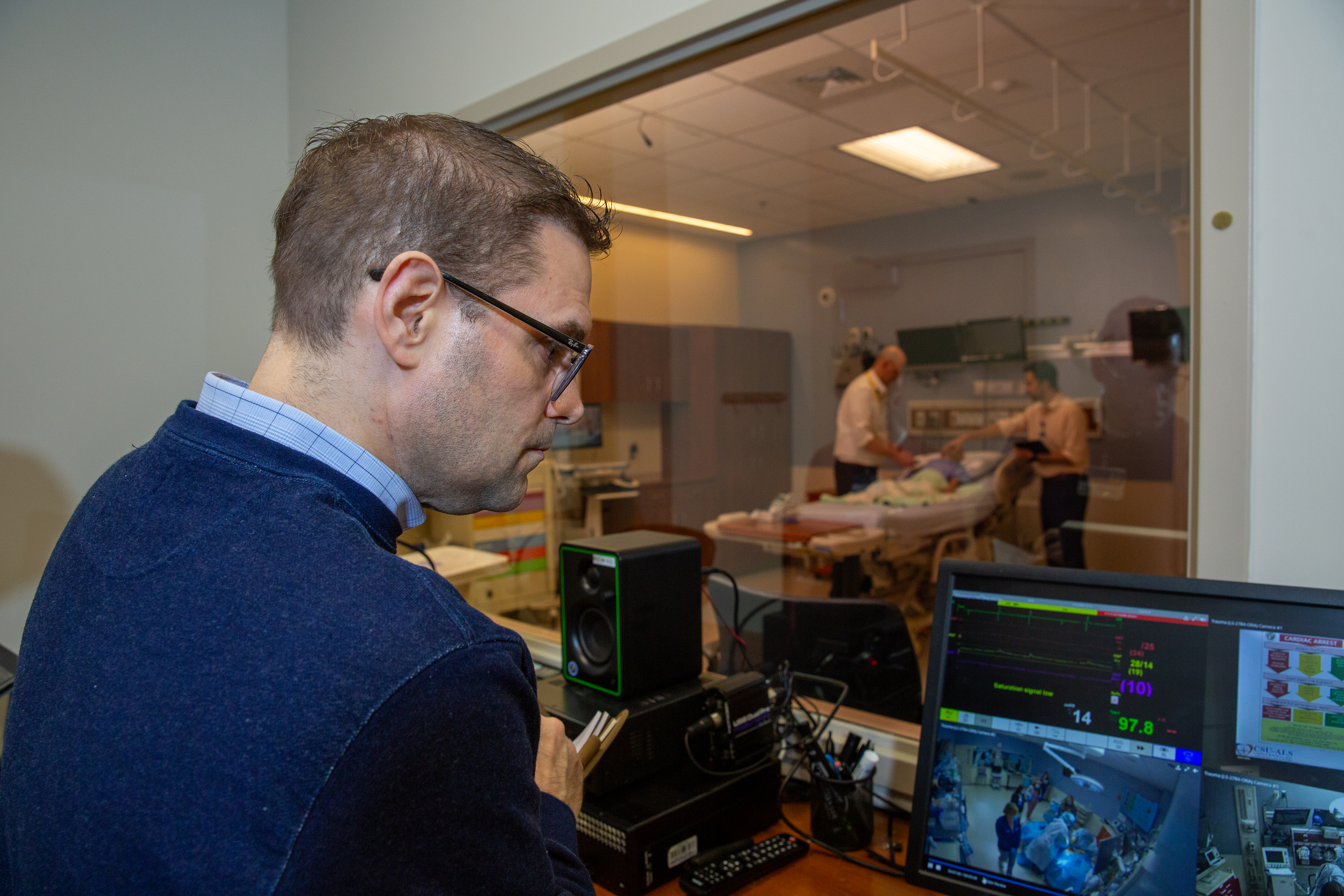 Man monitoring X-ray equipment
