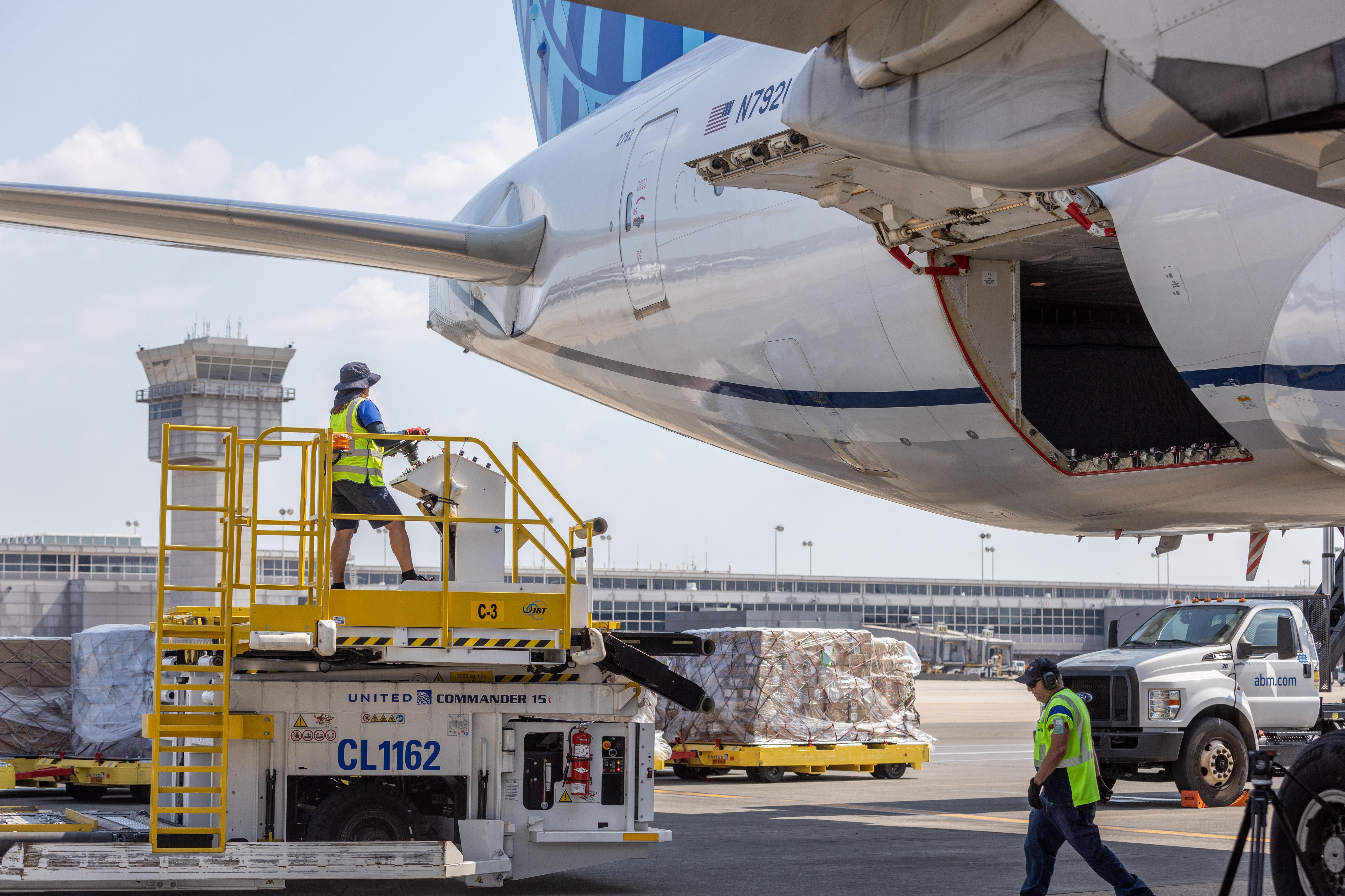 Cargo loaded into plane at Dulles International Airport. 