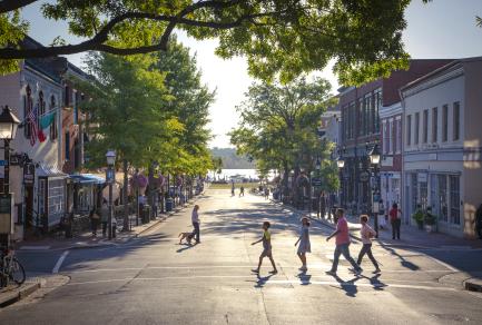People walking across the street in Old Town Alexandria