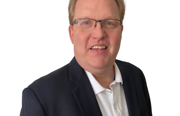 A headshot of Shannon Kellogg
