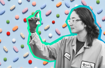 Merck scientist looking a vile. 