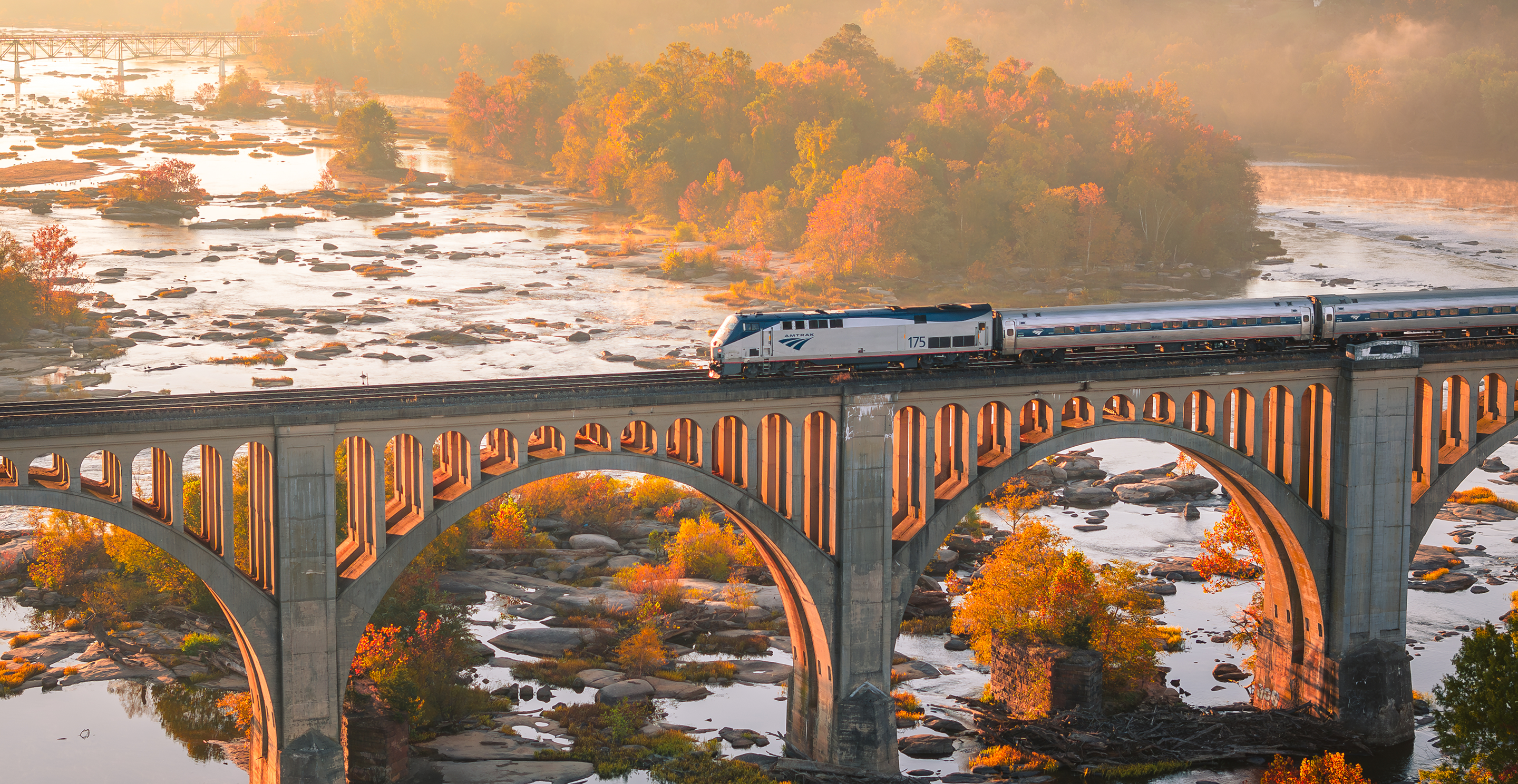 Train passing over a bridge in Richmond