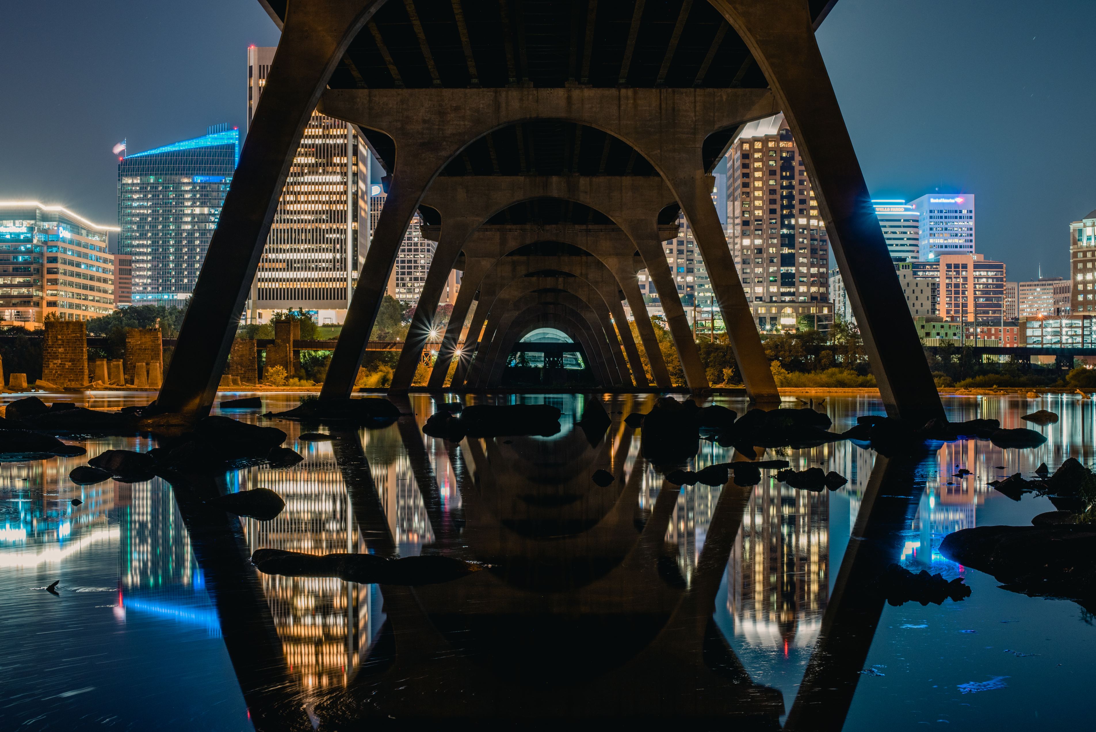 Underneath Manchester Bridge at night. 
