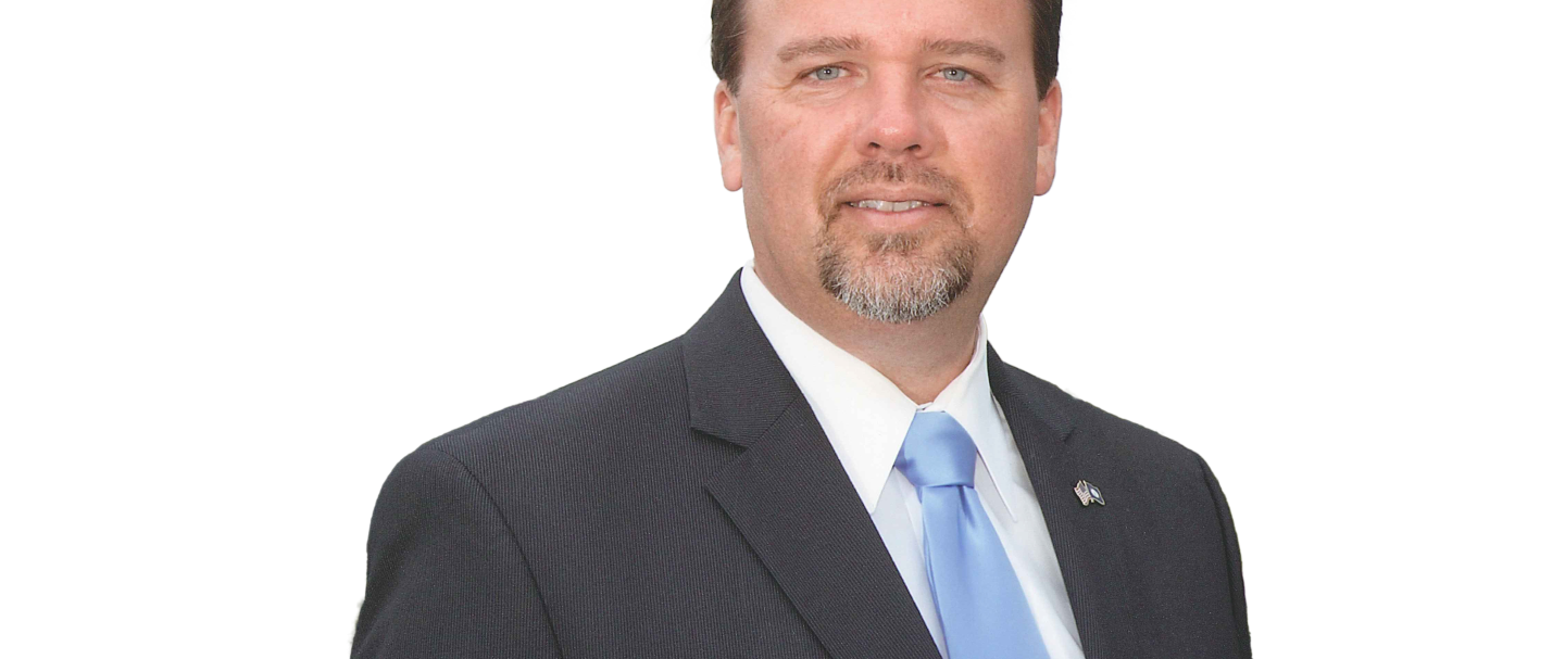 A headshot of Brett Vassey
