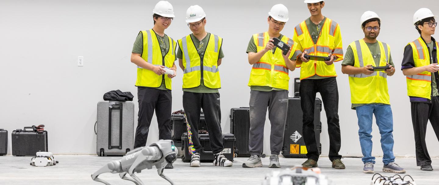 6 Students at GMU's Fuse building working with Artificial Intelligence 