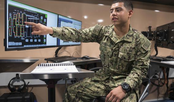 Veteran in front of a computer 