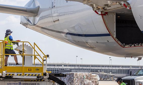 United Airlines plane and employee at Dulles