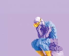 Thinker statue built out of a yellow, light blue and light purple block design