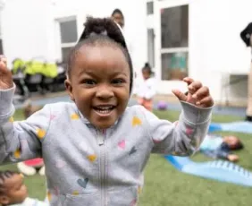 Child playing on playground during daycare