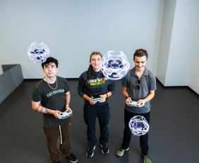 George Mason students with drones